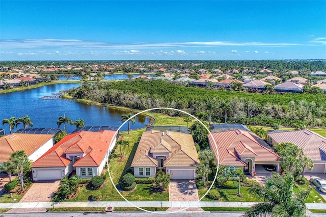 drone / aerial view featuring a water view