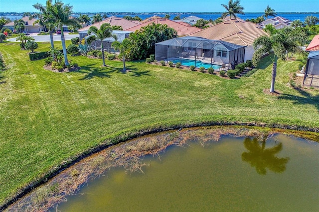 drone / aerial view with a water view