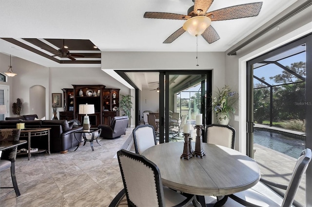 dining area with ceiling fan