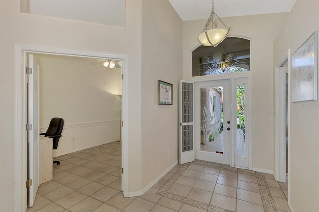 foyer featuring light tile patterned flooring