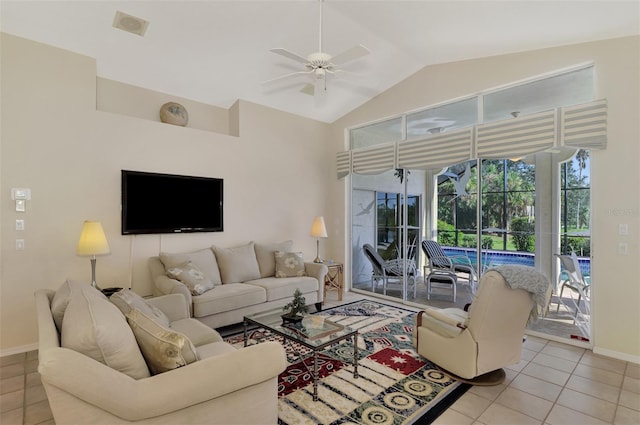 tiled living room featuring vaulted ceiling and ceiling fan