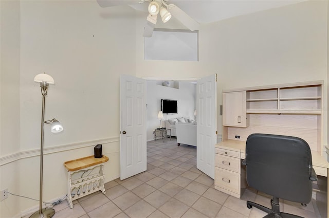 office area featuring ceiling fan and light tile patterned flooring