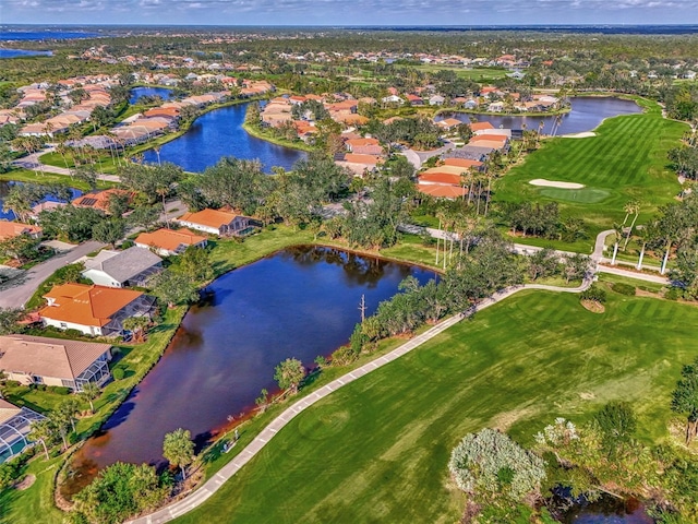 drone / aerial view with a water view