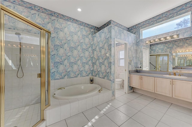 full bathroom with toilet, vanity, separate shower and tub, and tile patterned floors