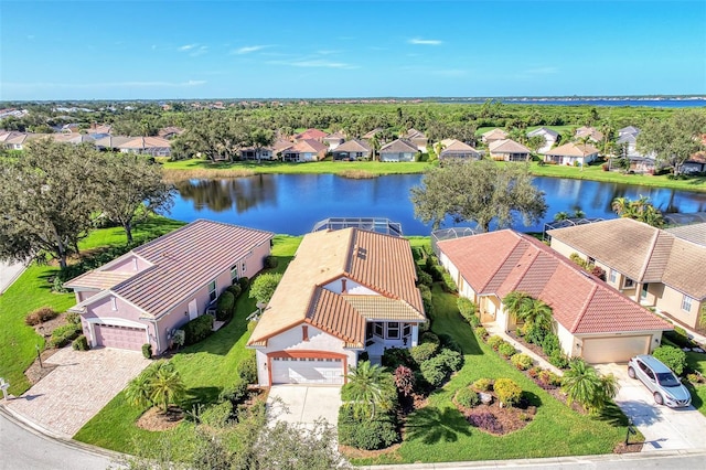 birds eye view of property featuring a water view