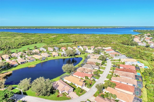 drone / aerial view with a water view