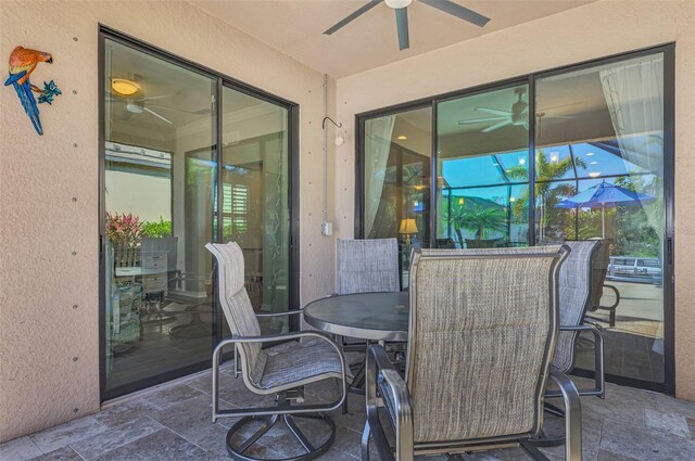 view of patio with ceiling fan