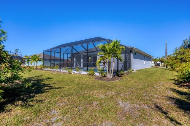 view of yard with a lanai