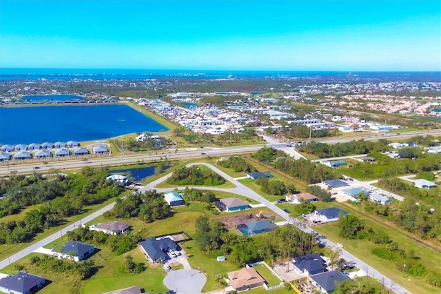 drone / aerial view featuring a water view