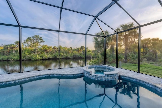 view of pool featuring a lanai and a water view