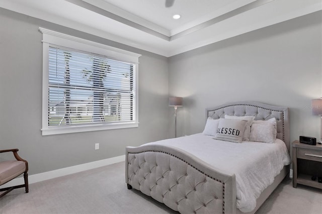 carpeted bedroom featuring multiple windows