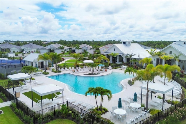 view of swimming pool with a patio