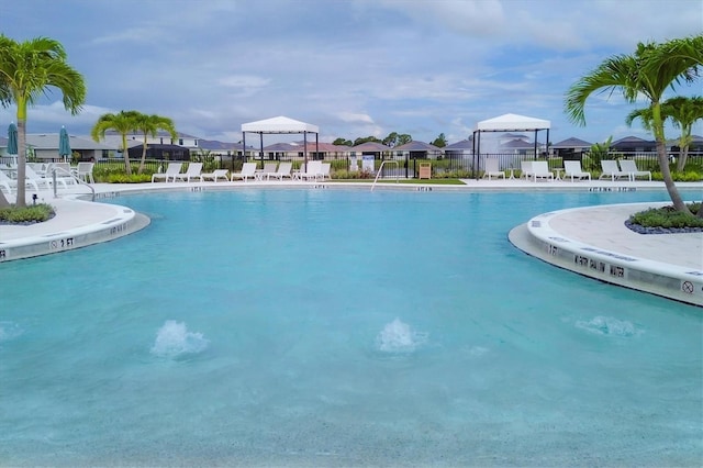 view of swimming pool featuring a gazebo