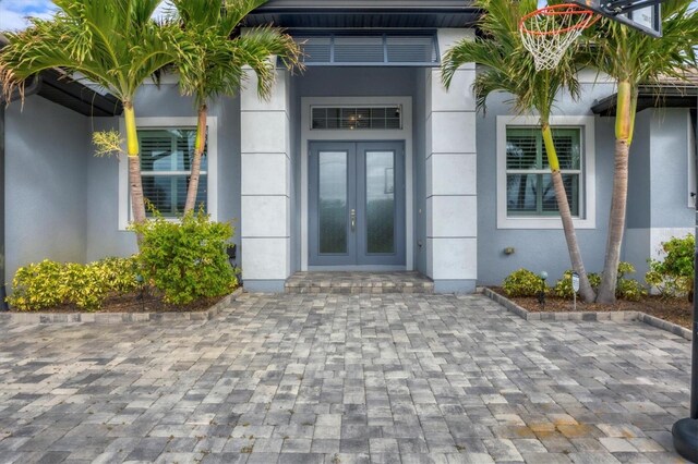 entrance to property featuring french doors