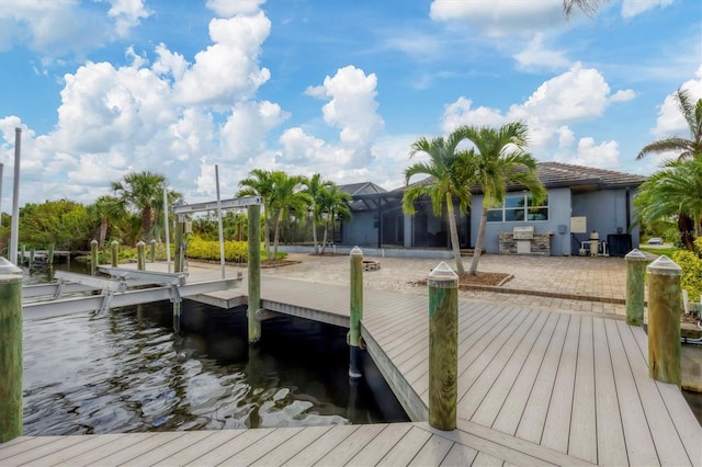 view of dock featuring a water view, glass enclosure, and central air condition unit