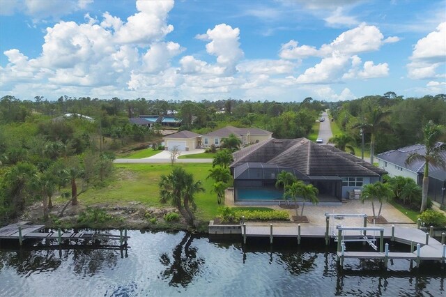 bird's eye view with a water view