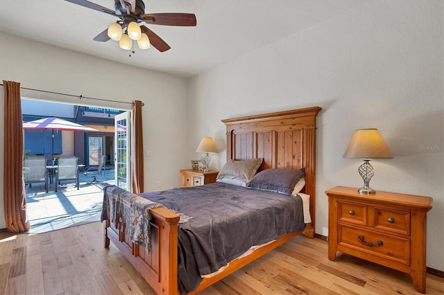 bedroom featuring ceiling fan, light hardwood / wood-style floors, and access to outside