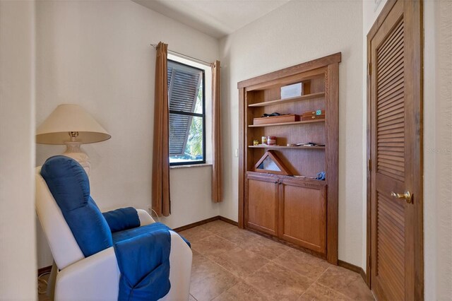 living area featuring light tile patterned floors