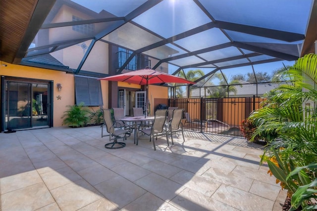 view of patio with a lanai