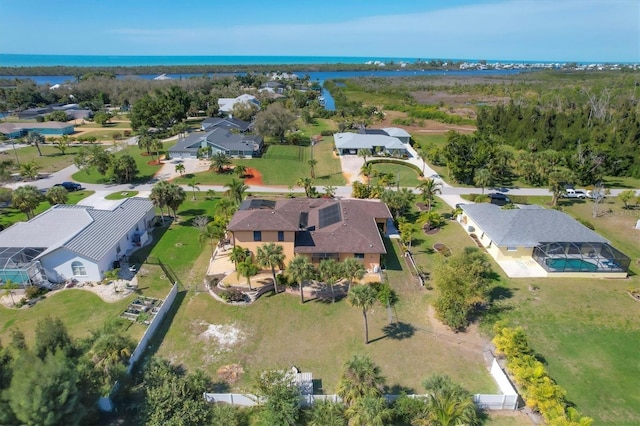 bird's eye view with a water view