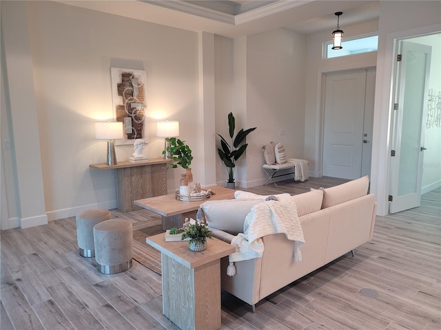 living area with light wood-style flooring and baseboards