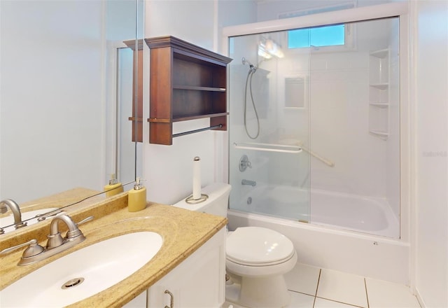 full bathroom with shower / bath combination with glass door, vanity, tile patterned flooring, and toilet