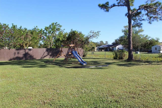 view of yard with a playground