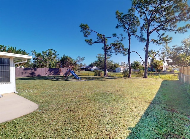 view of yard with a playground