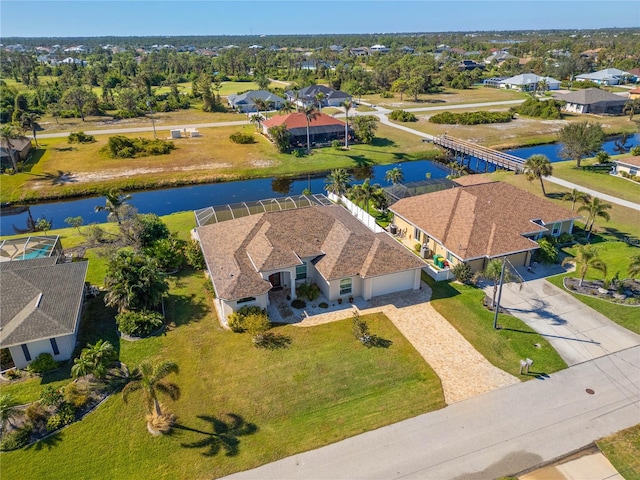 drone / aerial view with a water view