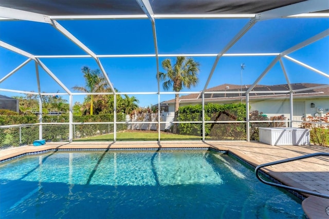 view of pool with a lanai