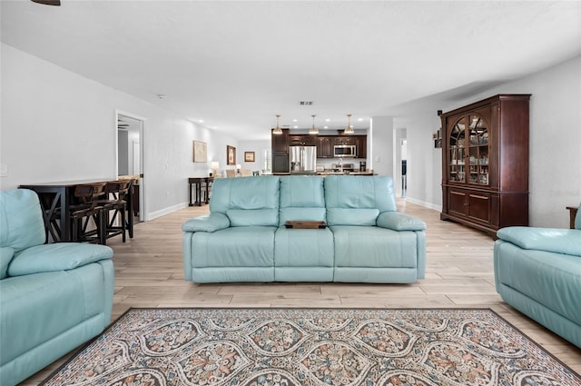 living room with light wood-type flooring