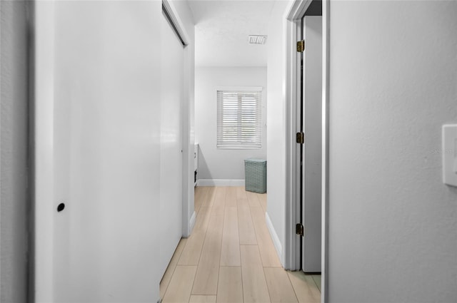 hallway featuring light hardwood / wood-style floors