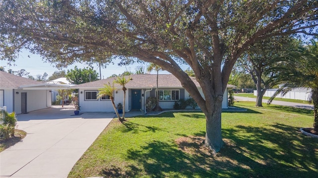 ranch-style house with a front lawn