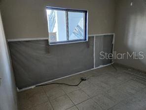 view of tiled empty room