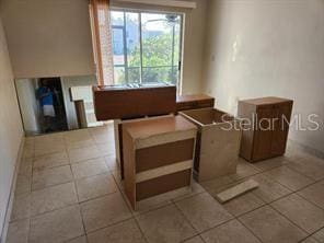 interior space with tile patterned flooring