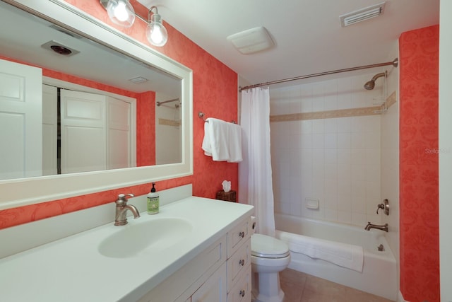 full bathroom with tile patterned flooring, vanity, shower / bath combination with curtain, and toilet