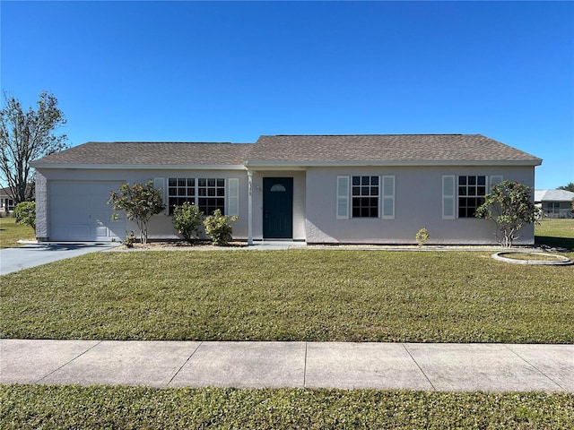 ranch-style house with a front yard and a garage