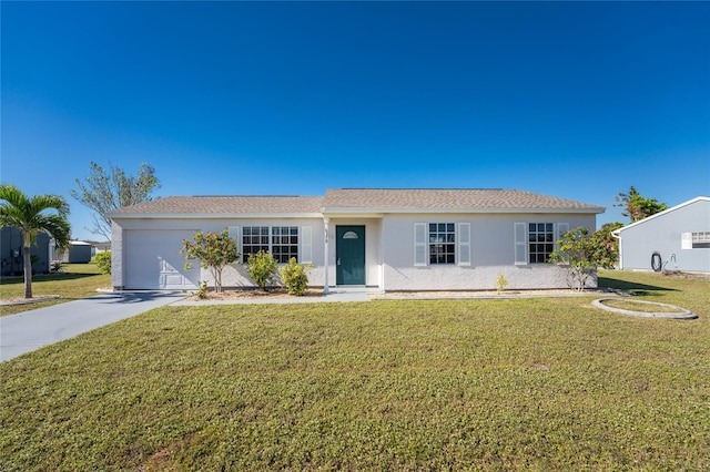 single story home with a front yard and a garage