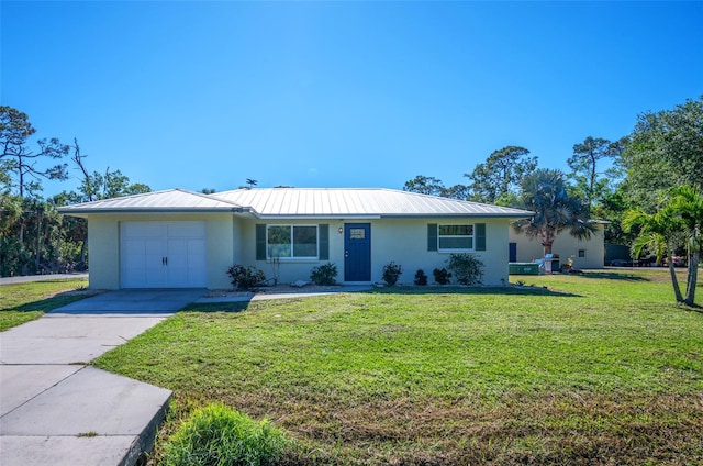 ranch-style home featuring a garage and a front lawn