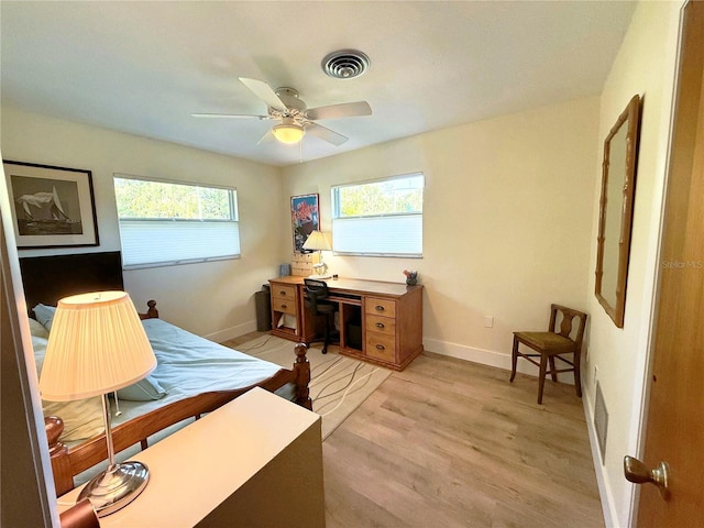 bedroom featuring ceiling fan and light hardwood / wood-style flooring