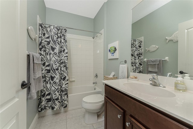 full bathroom with tile patterned flooring, vanity, toilet, and shower / bath combo with shower curtain