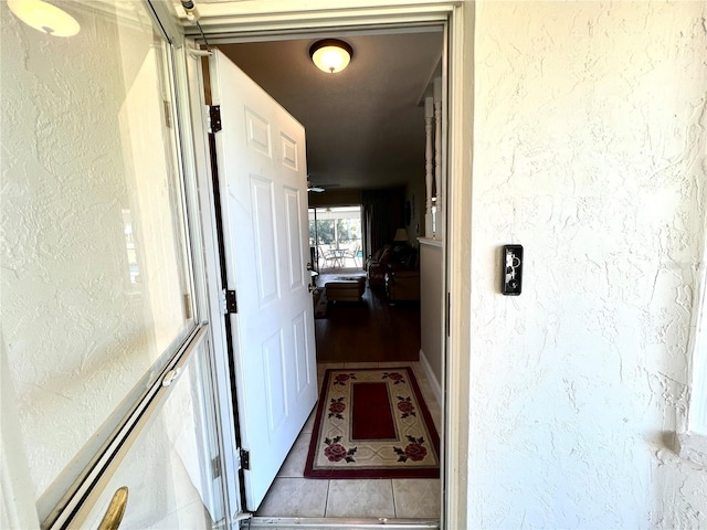 corridor with wood-type flooring