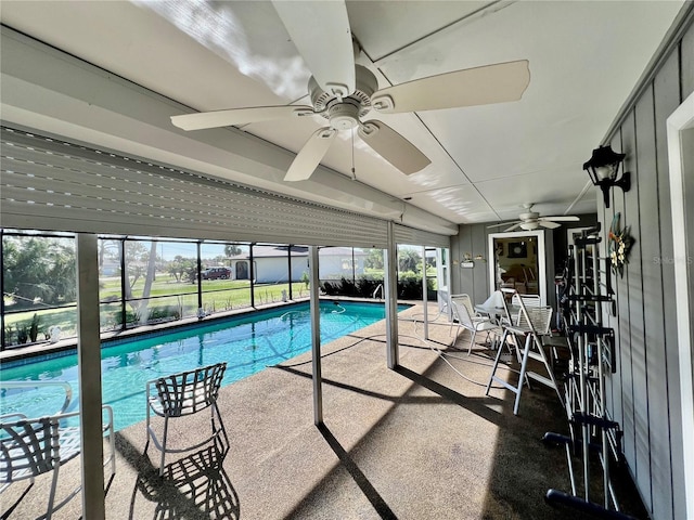 view of pool with a lanai and a patio