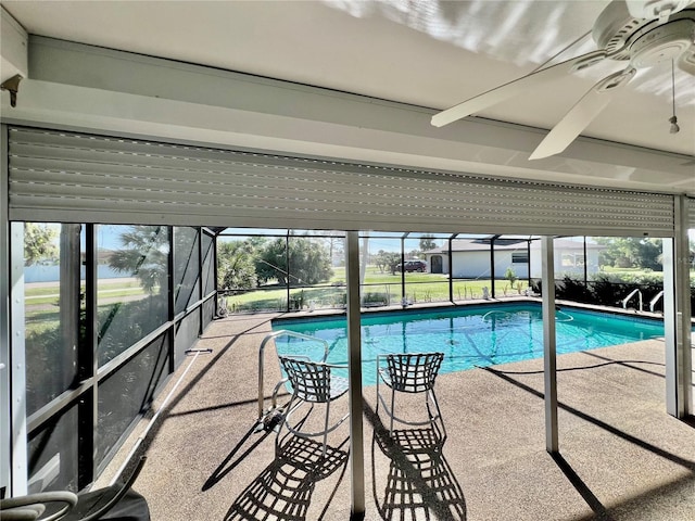 view of pool with ceiling fan