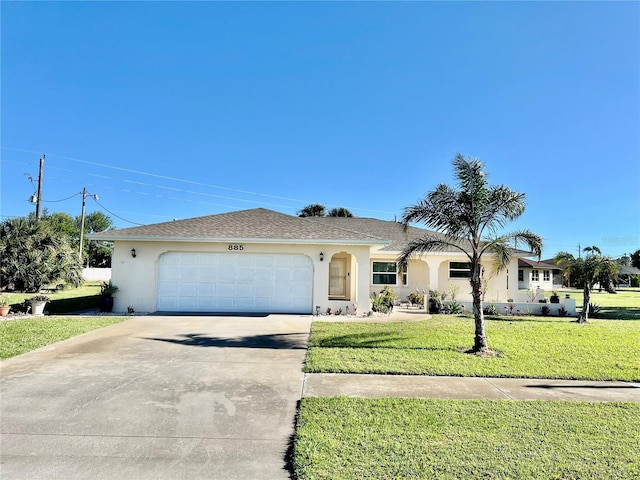 single story home with a garage and a front lawn