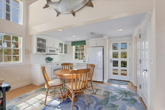 dining room featuring light hardwood / wood-style floors