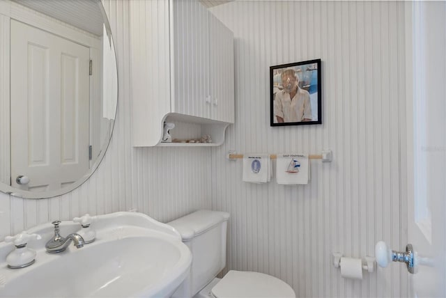 bathroom with sink and toilet