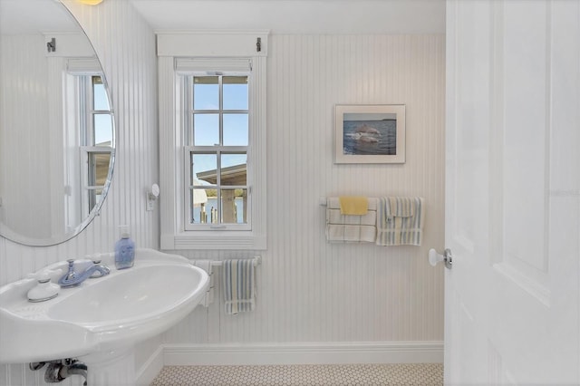 bathroom with sink and tile patterned flooring