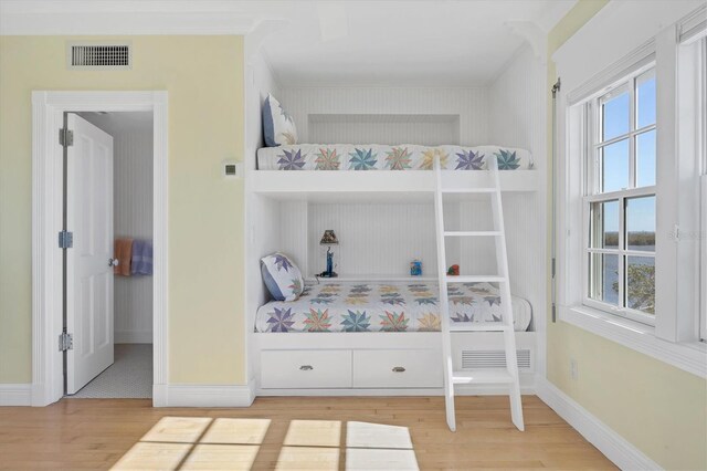 bedroom featuring wood-type flooring