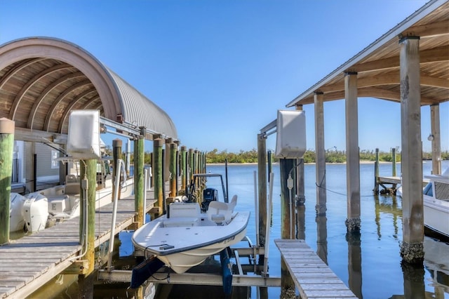 dock area featuring a water view